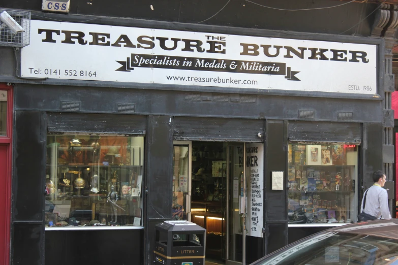 the outside view of a store front for the treasure bunker