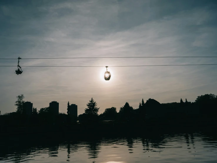 the sky and clouds are reflecting on the water