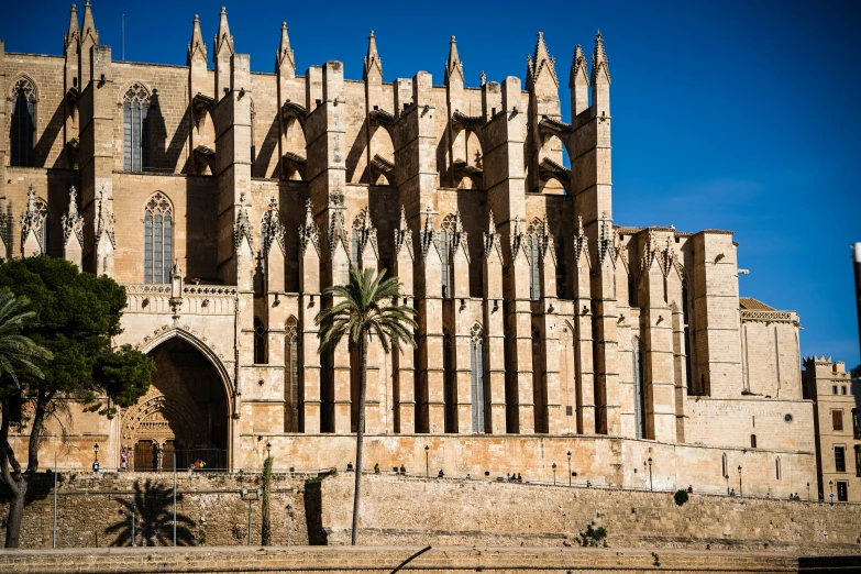 an old castle that is surrounded by a lot of towers