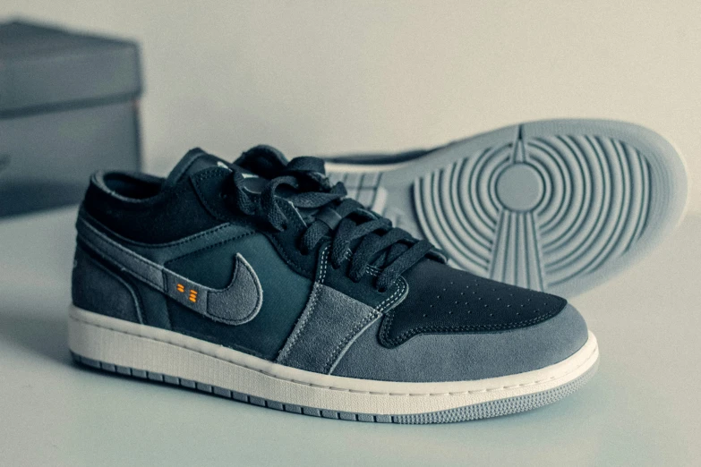 the nike air jordan 1 low premium returns in black and dark smoke