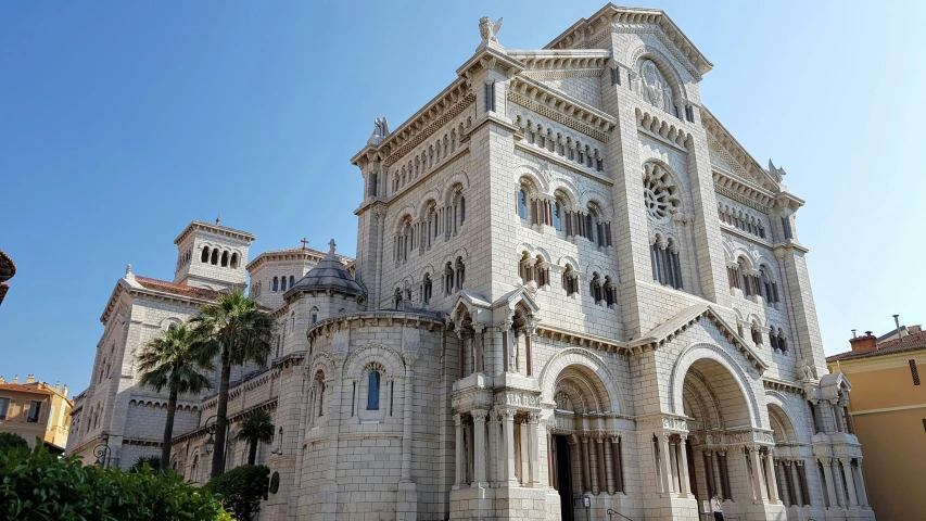 a castle like building with multiple turrets on a clear day