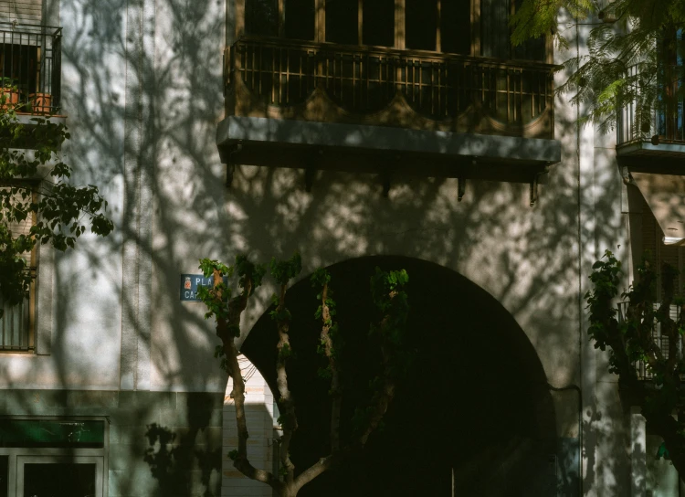 an image of shadows on the side of a building