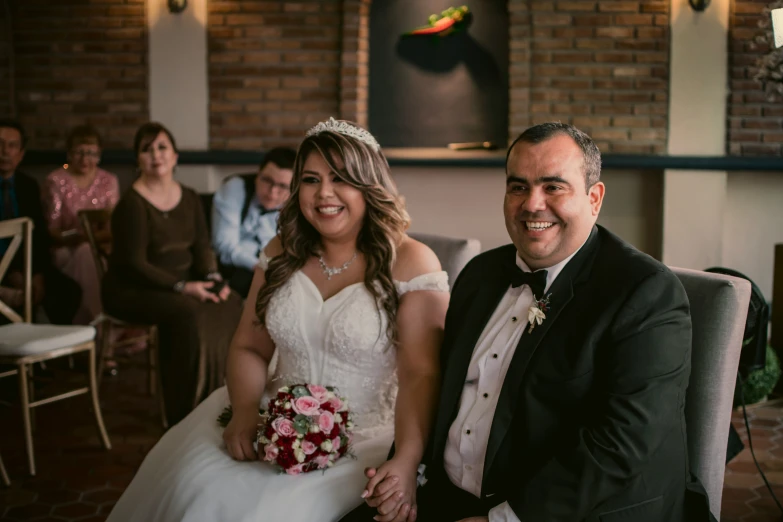 the bride and groom are posing for a po