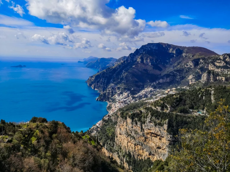 a large island with very tall cliffs sitting in the middle of it