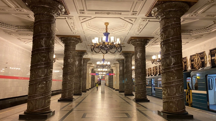 this is a building with columns and chandelier