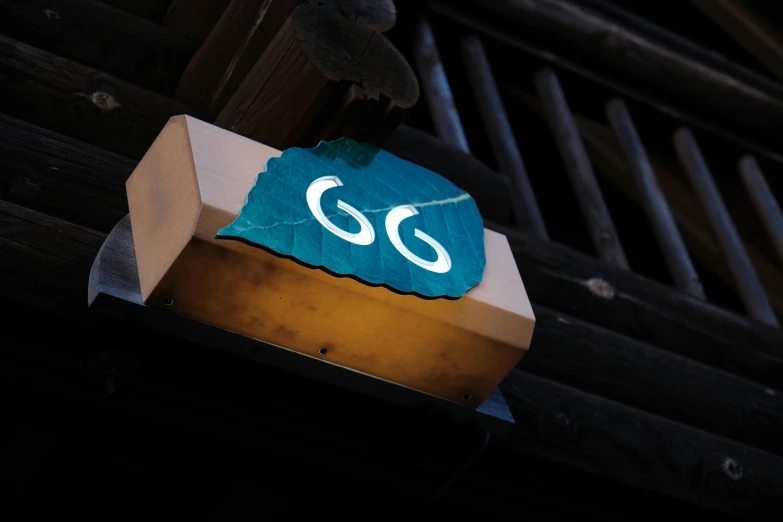 the sign of ggt is posted on the side of the building