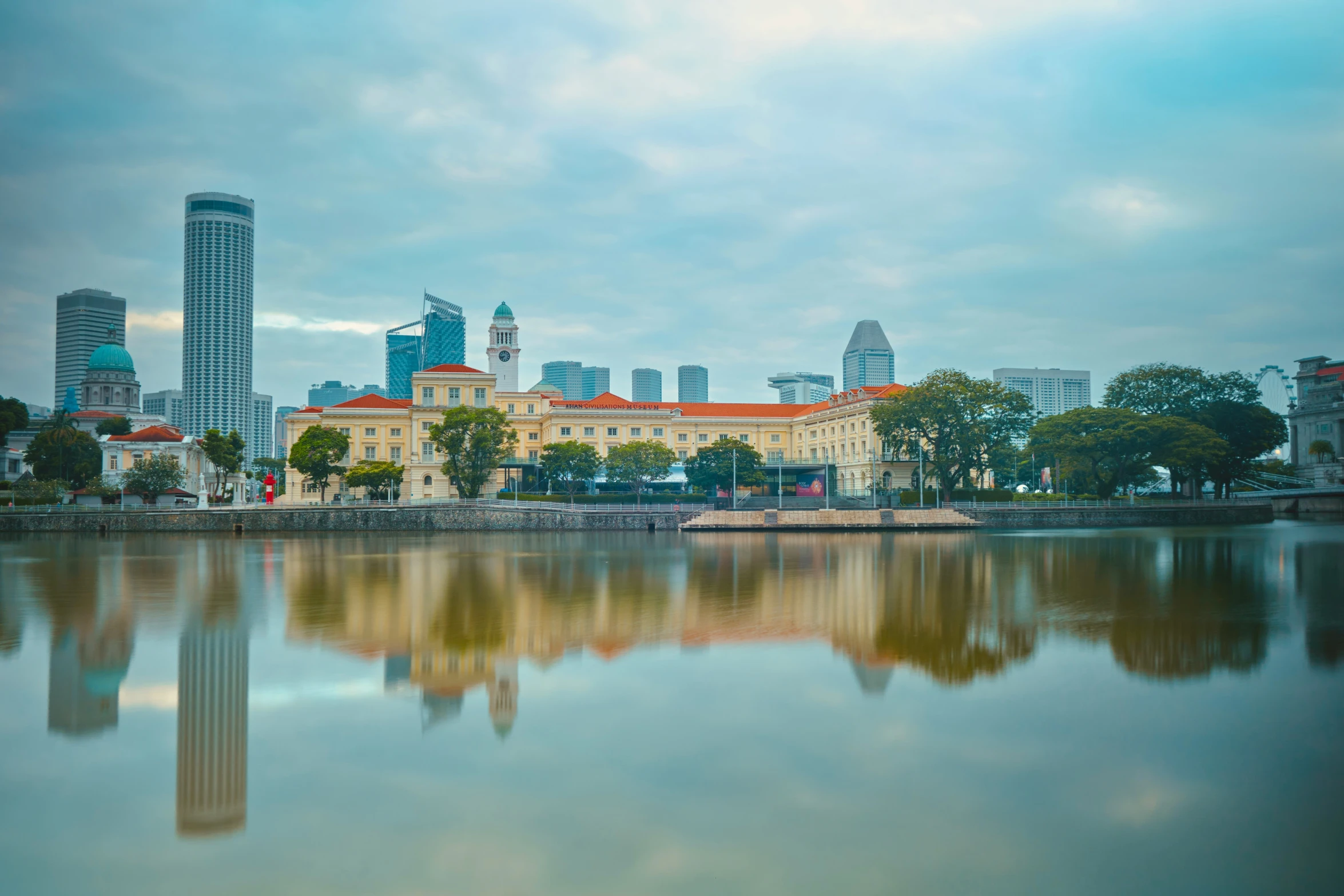 a river view with some buildings in the background