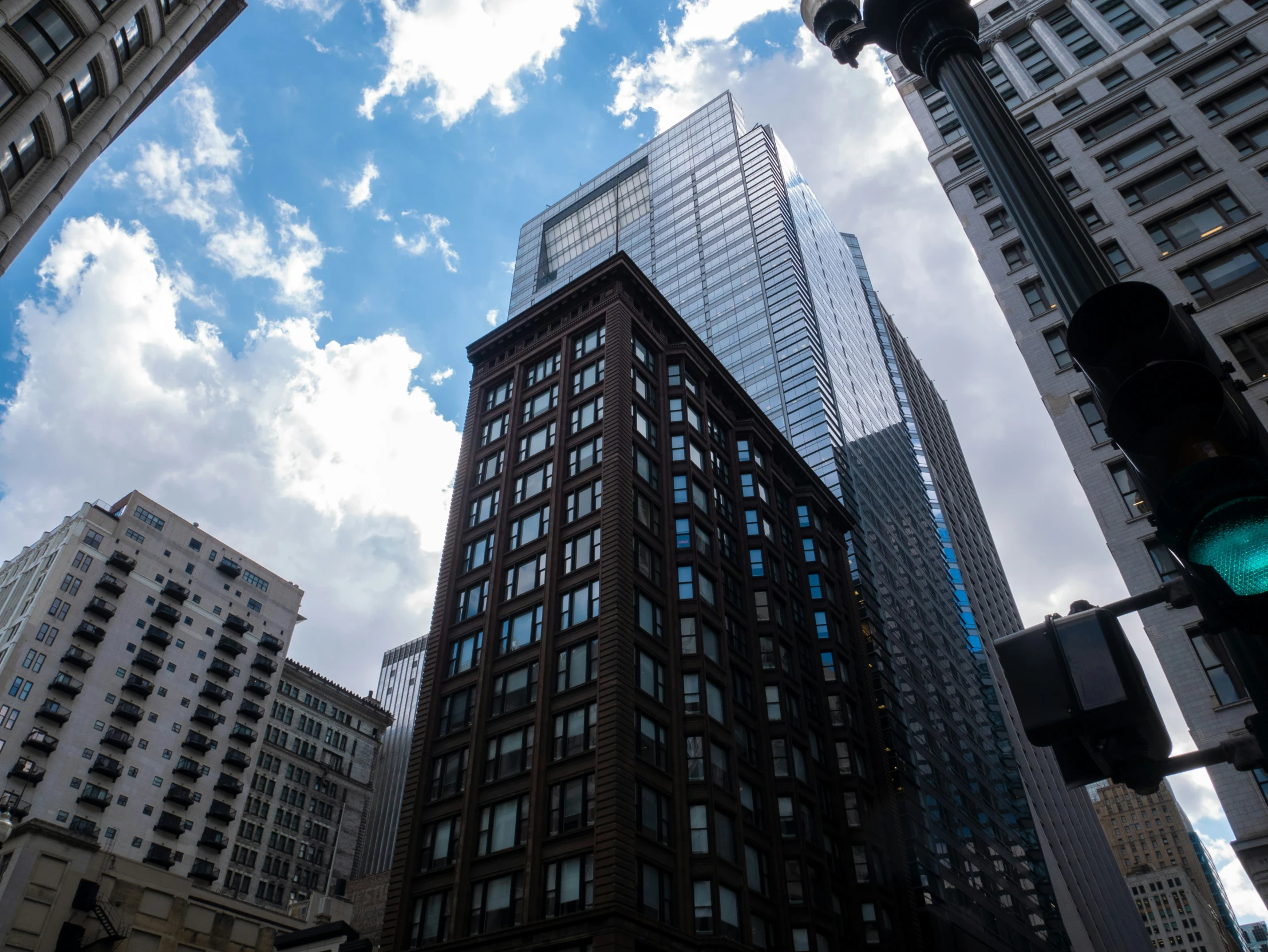 a group of buildings on the corner of a street