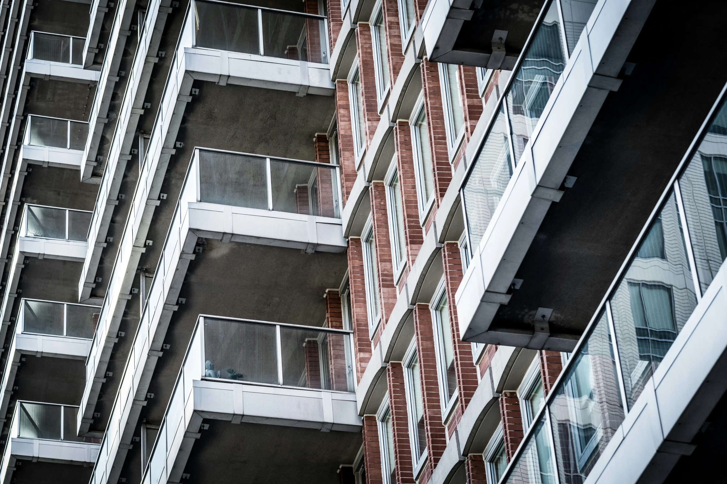 multiple levels of brick and steel building next to each other