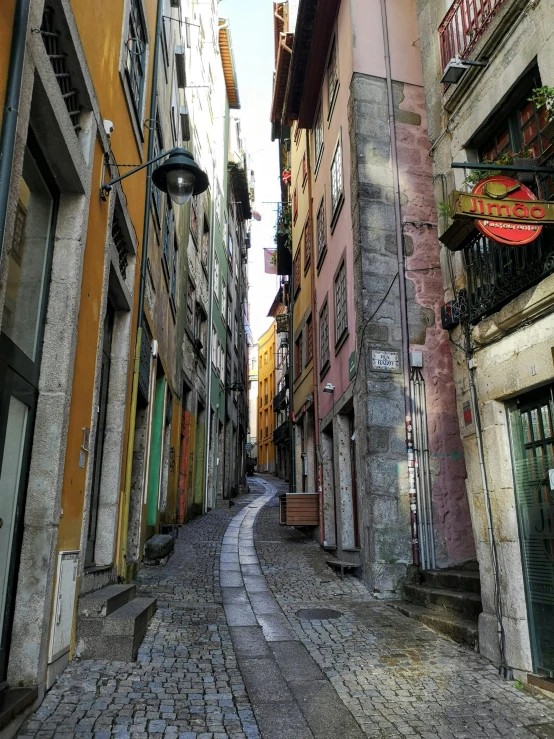 an image of a narrow street in europe