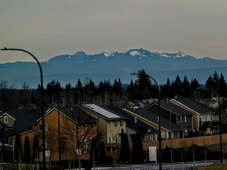 view of the city with a mountain in the background