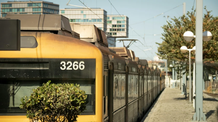 an old train is parked in front of a building