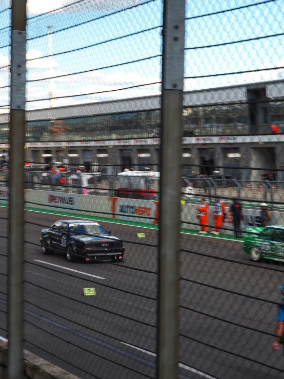 a race car makes its way down a track