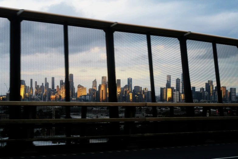 a view of a fence in the city