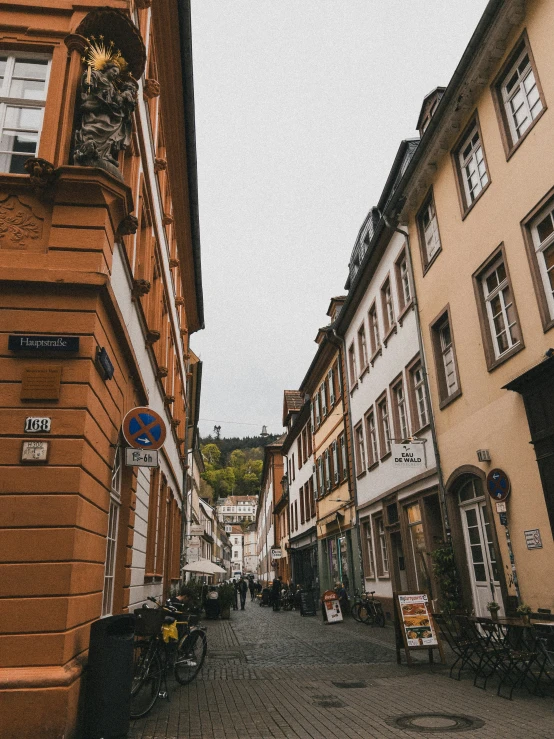 street with buildings and a small walkway through it