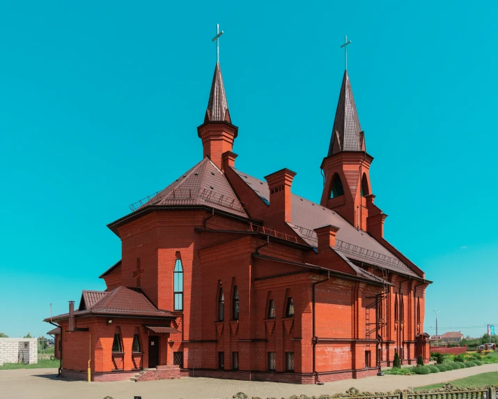 an old church in the countryside is seen from across the street