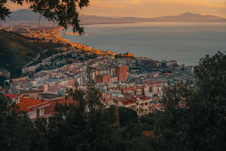 the view of a town is at sunset