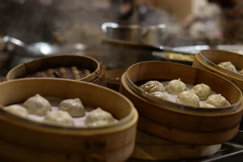 four wooden baskets of food sit next to each other