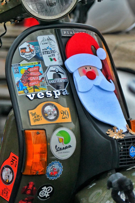 a motorcycle with stickers and decorations on it