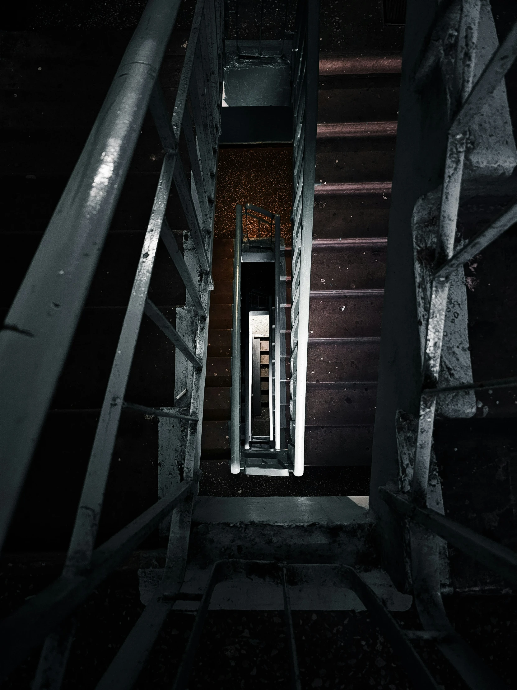 looking up at a stairway in the middle of an unfinished building