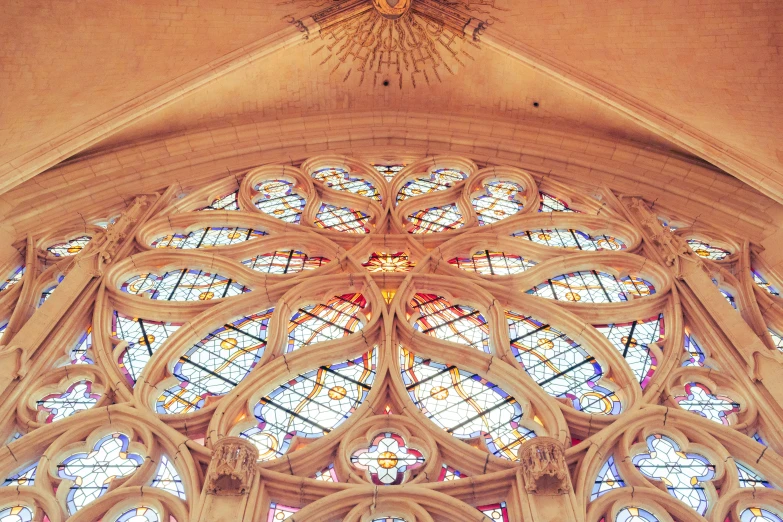 stained glass windows in a cathedral and ceiling