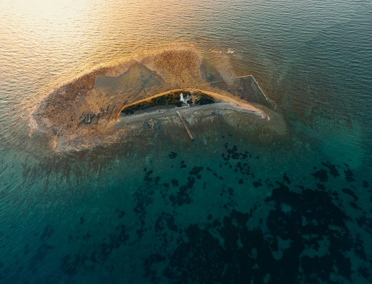 an island sits on the ocean near another one