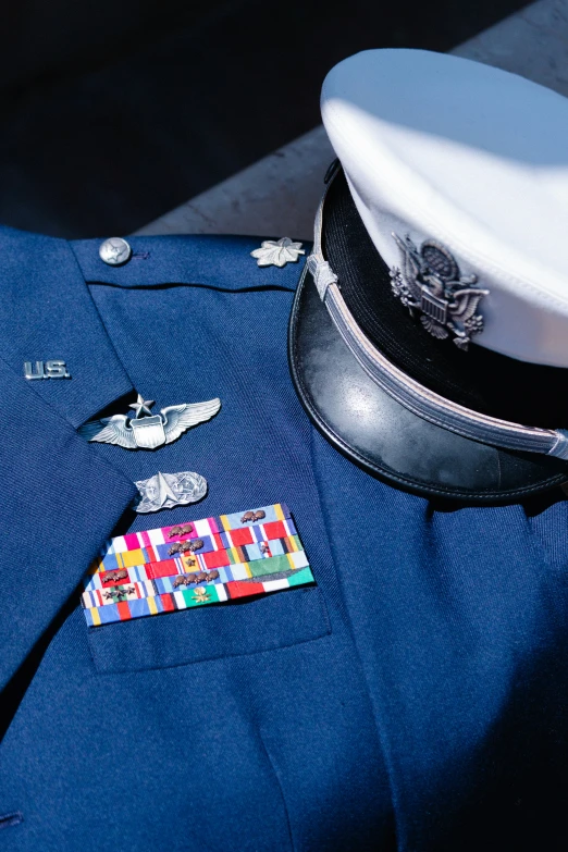 a police officer uniform with badges on the chest