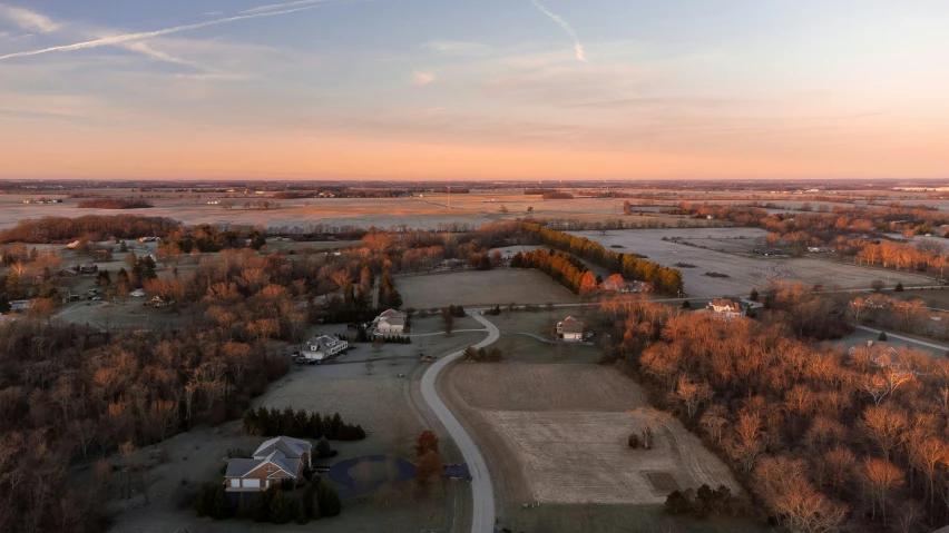 an aerial view of some houses and trees