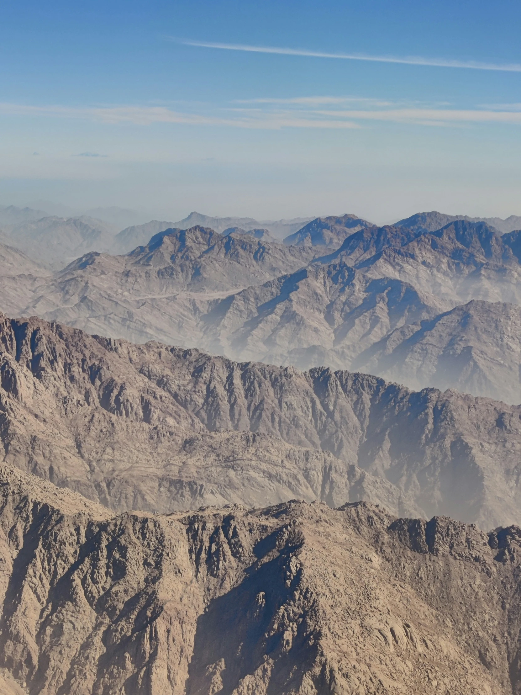 the view from a helicopter looking down on some mountains