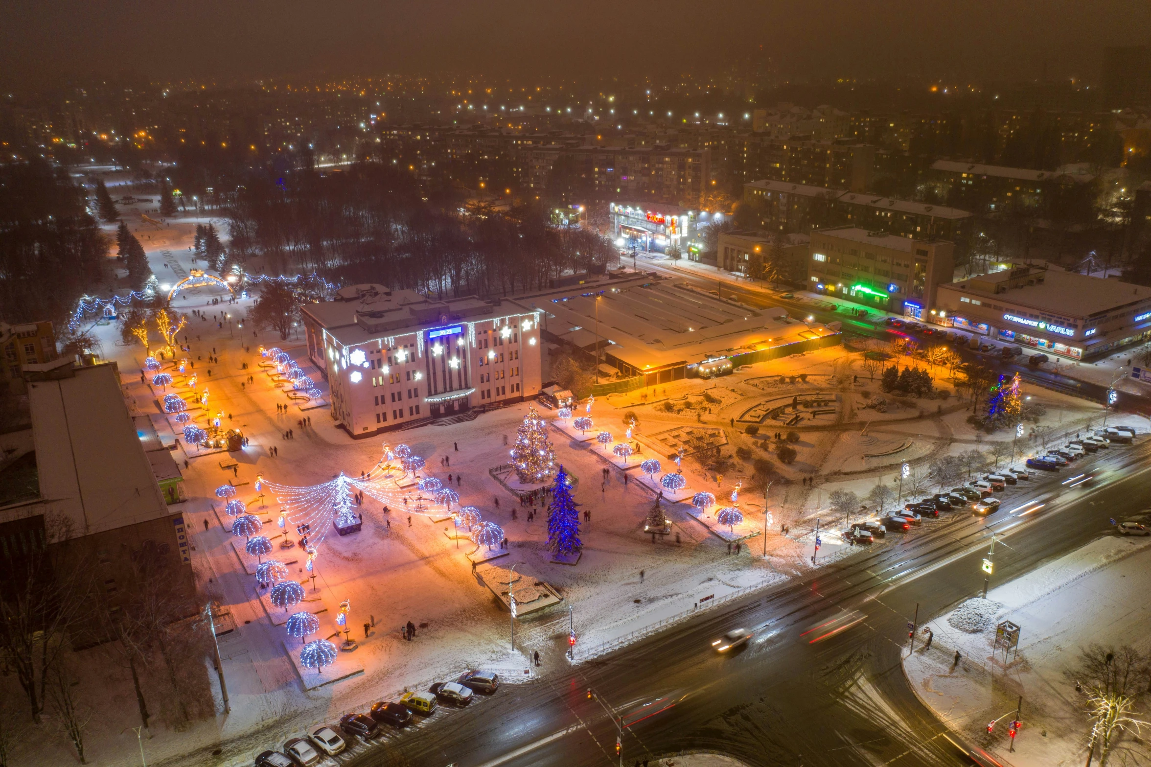 an overhead view of a city street at night