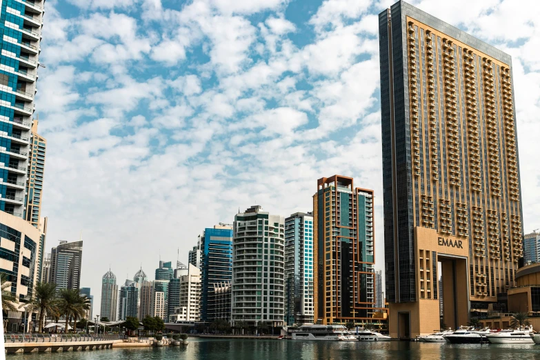 there are buildings along the waterfront of a city