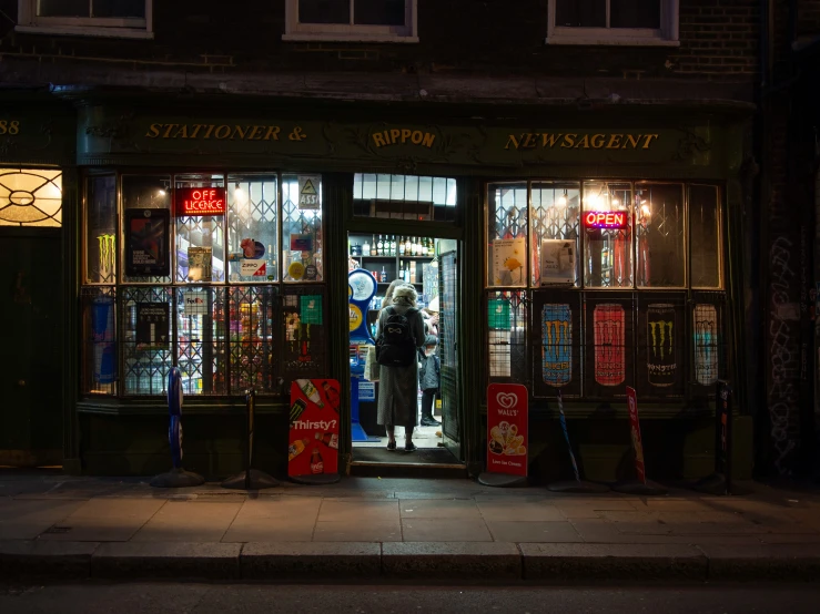 an older shop front with its light on