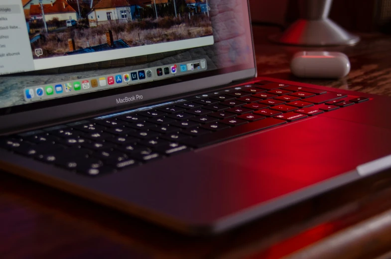 a laptop sitting on top of a table