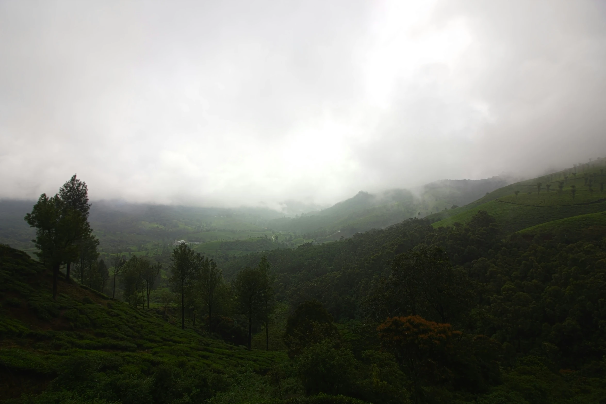 fog and low cloud moving across a valley