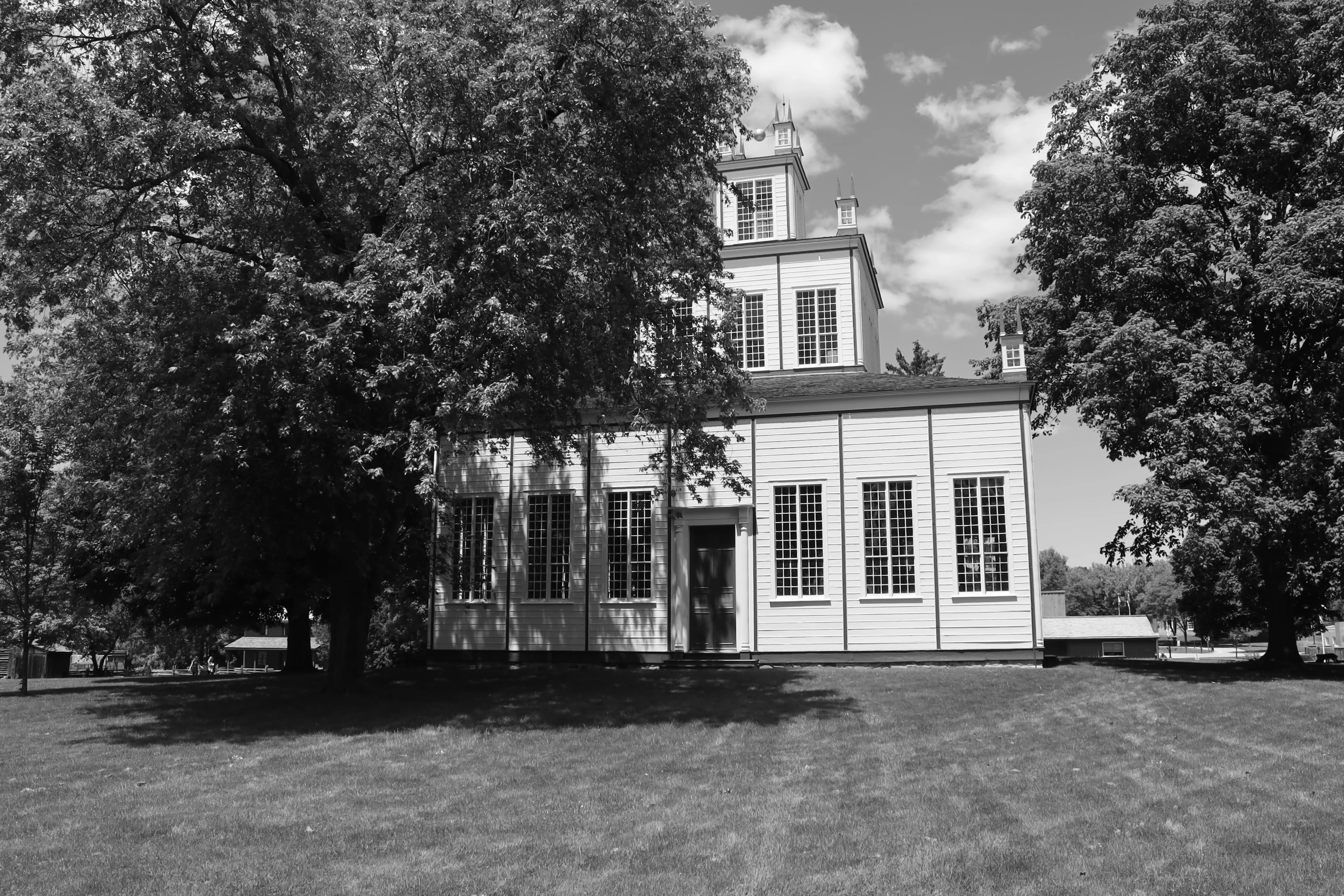 black and white pograph of the side of a church