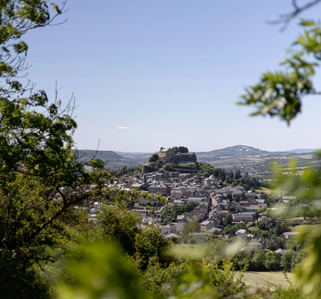 a po looking down on the town from a hill