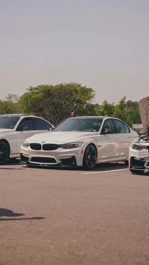 a few cars that are parked in a parking lot