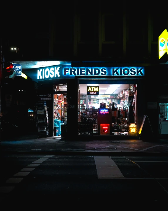 a store at night with neon lights lit up