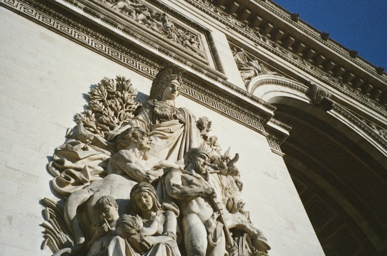 the decorative carvings on the side of the building
