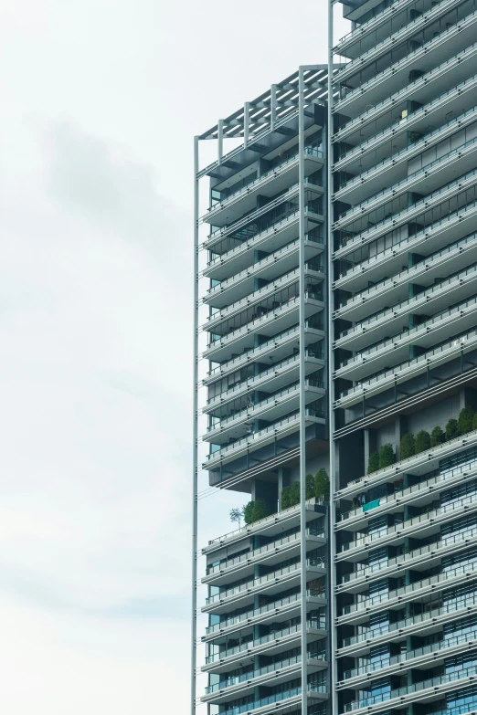 a clock on the side of a tall building