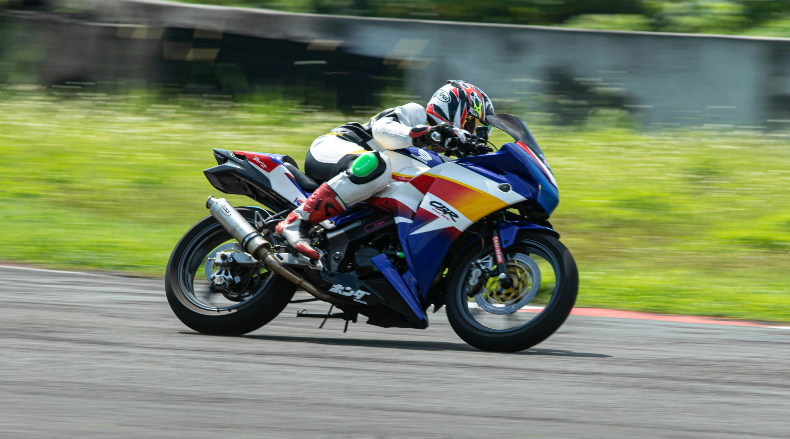 a person riding on the back of a motorcycle