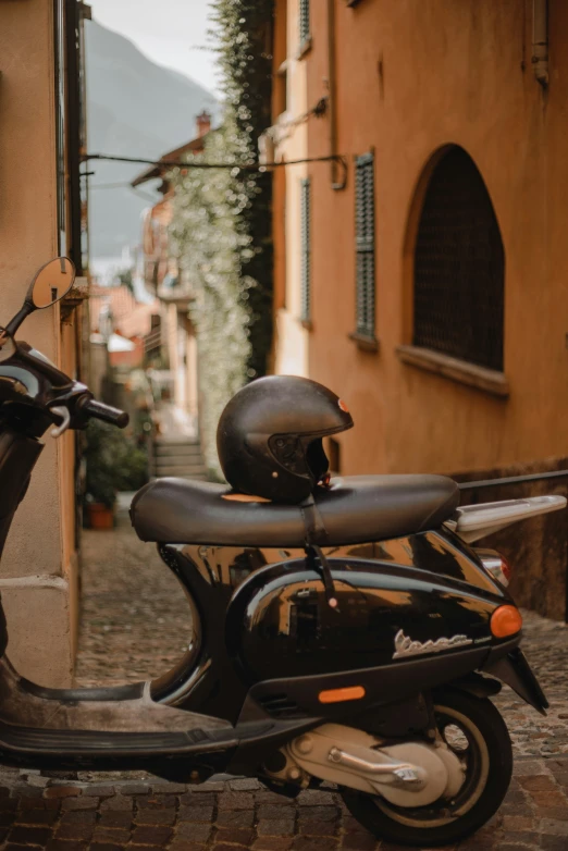 an image of a motor scooter parked on the side of a street