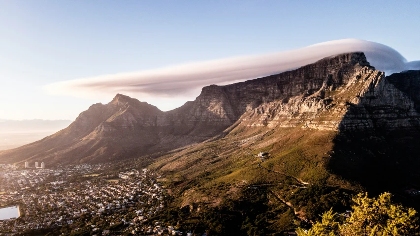 a mountain with a cloud cover is shown