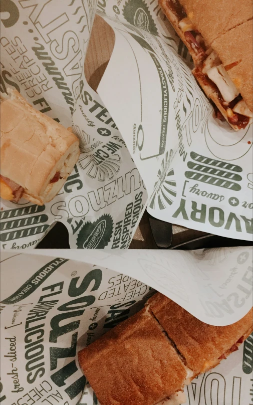 some sandwiches sitting next to each other on a table