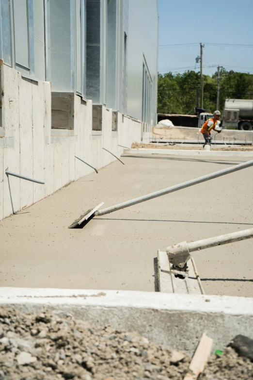 a person riding a skateboard on top of a cement ramp