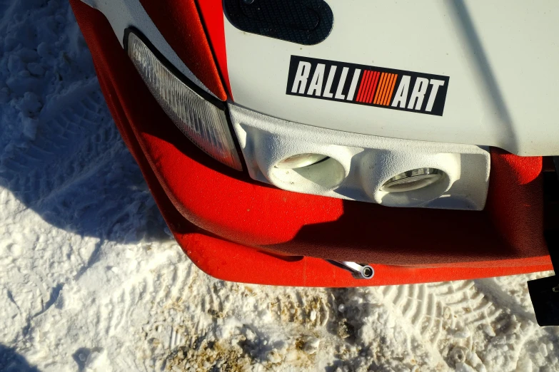 the taillight and the ke rim on a red sports car