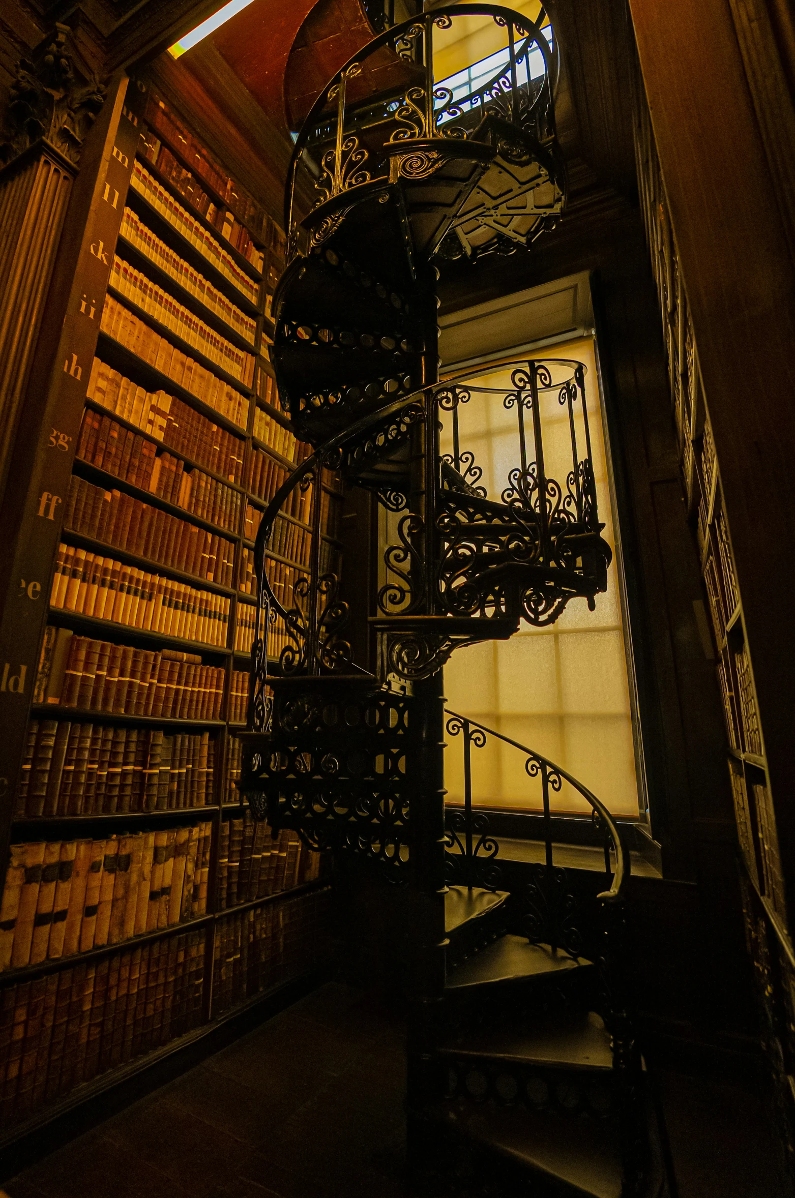 the staircase leading to the top floors of an antique liry