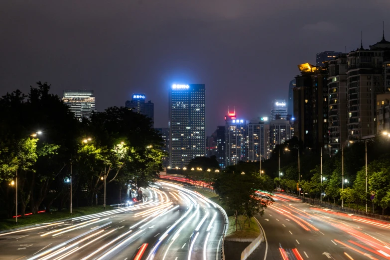 some big pretty street lights and buildings with lights