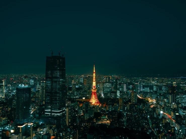 night city lights and skyscrs lit up in the distance