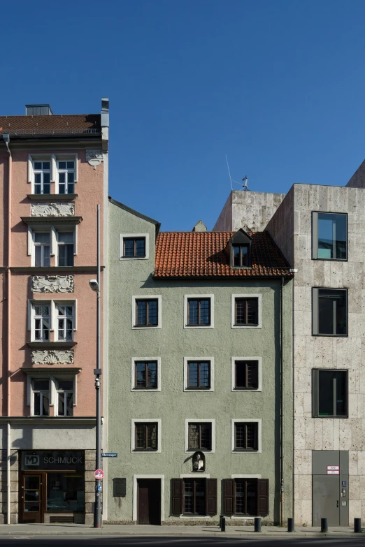 a few buildings with one of the windows missing